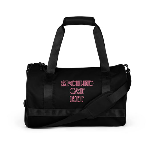 SPOILED CAT KIT- (CAT OWNER IS ALSO SPOILED) WRITING IN PINK TRAVEL OR STORAGE BAG