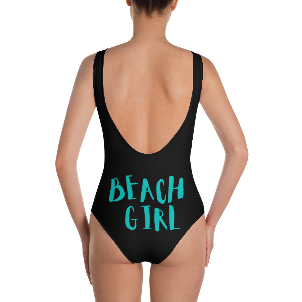 BEACH GIRL--BLACK SUIT IN BLUE WRITING One-Piece Swimsuit